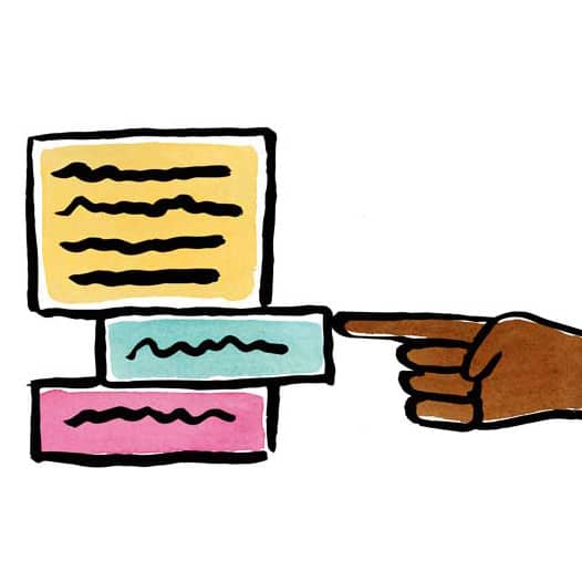 a finger pointing to a part of a letter or document
